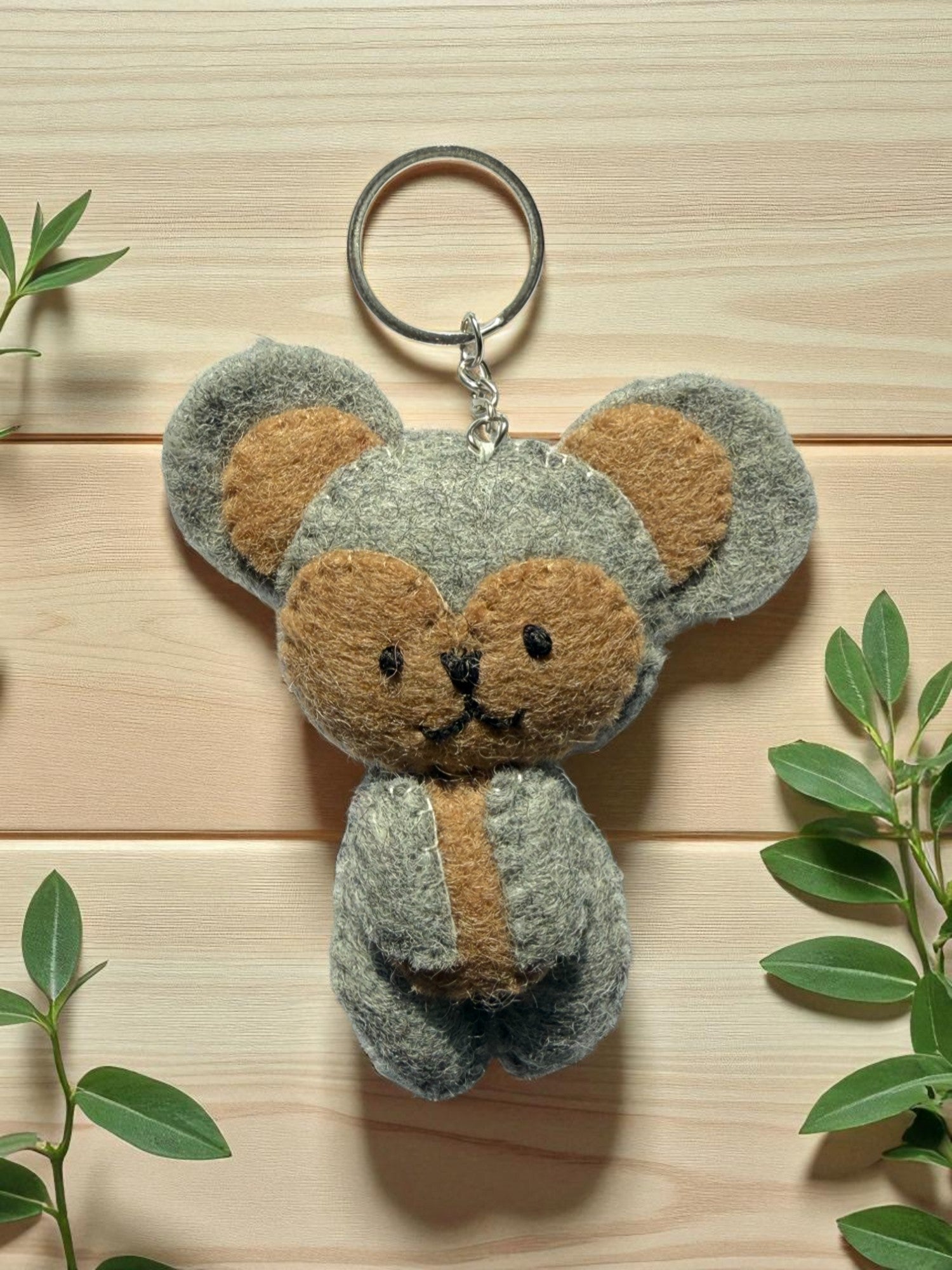 Handmade felt keychain featuring a koala by artisans in Nepal, fair trade and eco-friendly