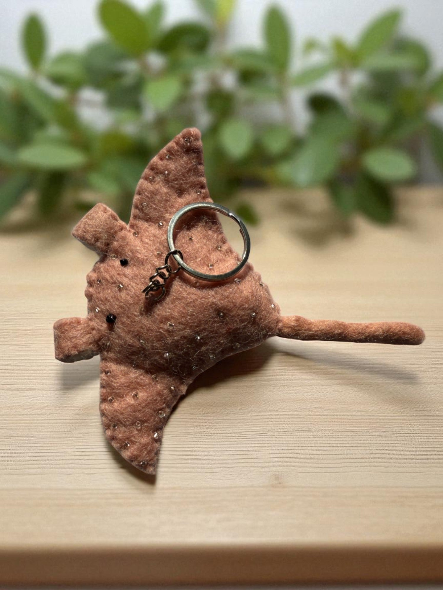 Handmade felt keychain featuring a stingray by artisans in Nepal, fair trade and eco-friendly
