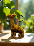 Handmade felt keychain featuring a giraffe by artisans in Nepal, fair trade and eco-friendly