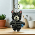 Handmade felt keychain featuring a cat with stripes crafted by artisans in Nepal, fair trade and eco-friendly