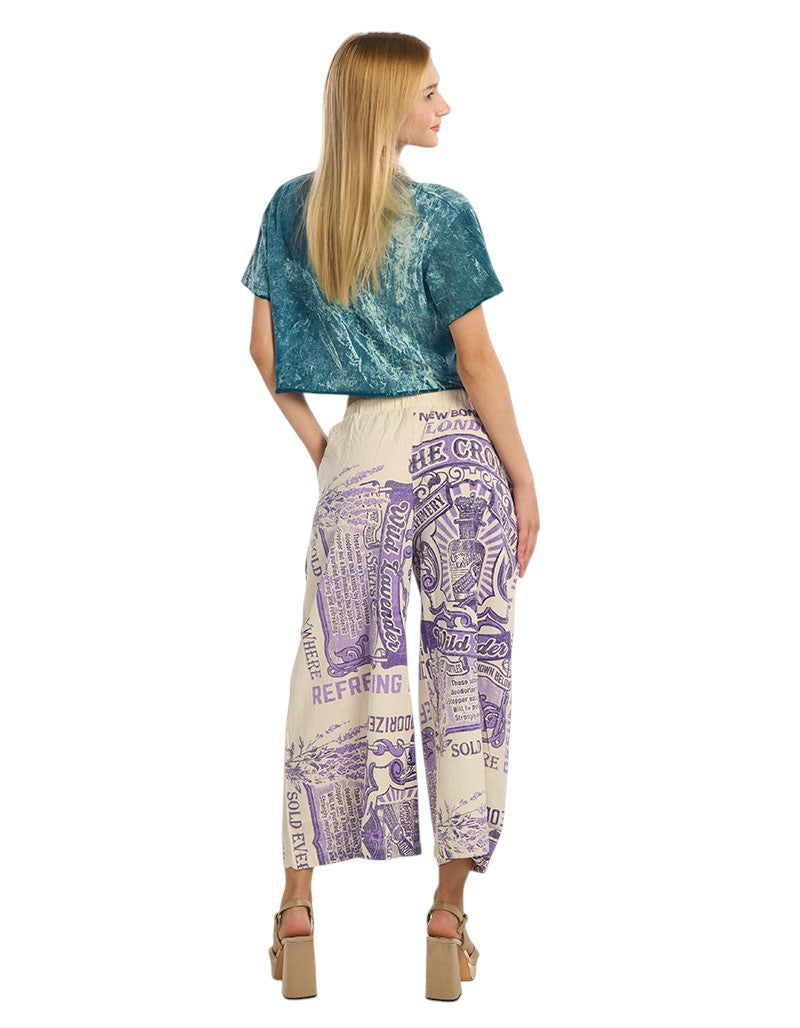woman wearing vintage wild lavender salts feed sack wide leg pants
