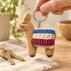 Handmade felt Brown Llama keychain shown in a lifestyle setting