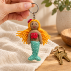 Handmade felt Mermaid keychain shown in a lifestyle setting