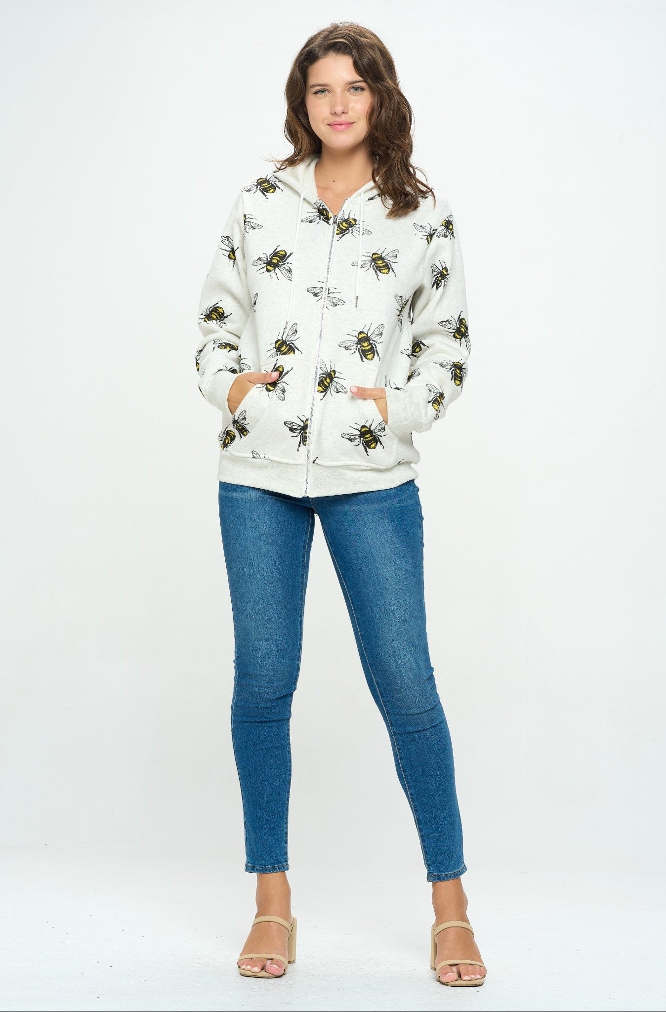 woman wearing bees printed all over zipper hoodie